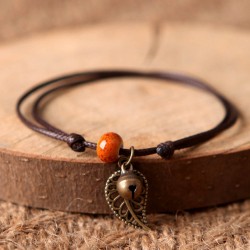 Bracelet ajustable en corde et perle en céramique